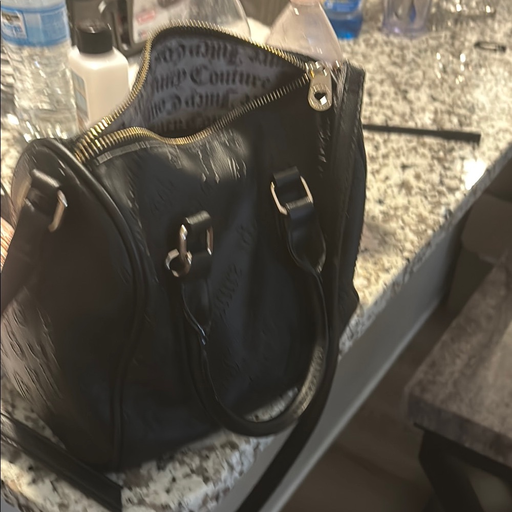 Juicy Couture Black Satchel with Structured Design